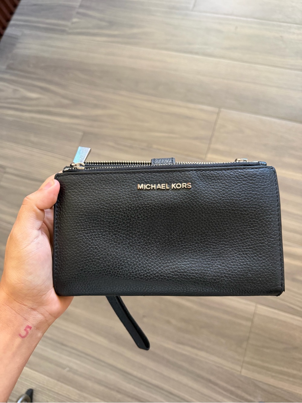 Michael Kors Black Pebbled Leather Wristlet with Gold Logo